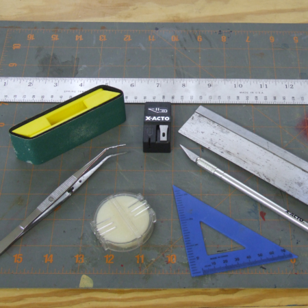 Tools for model ship building kit or scratch-building tweezers sanding block steel ruler xacto razor knife and lots of blades