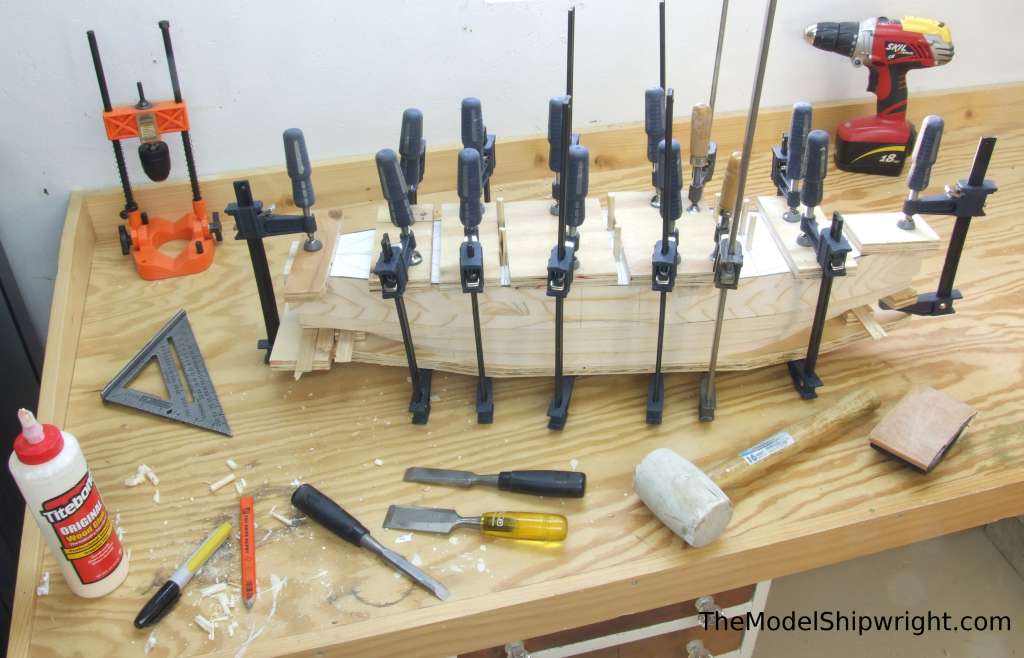 All lifts glued and clamped, Ship model, Arab, Sambouk, dhow, scratch-building, solid hull, bread-and-butter, sawing, lifts, gluing, clamps